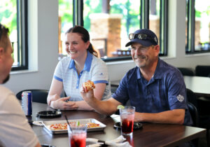 Golfers Dining Post Round Enjoying Food and Drinks at Battle Ground Golf Club